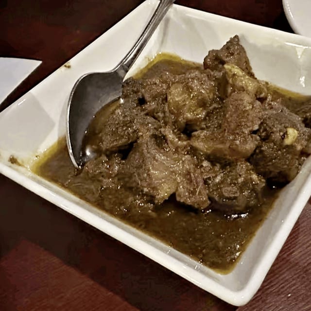 Curry Goat Side.